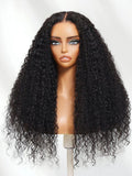 The UNice Bye Bye Knots 7x5 Lace Multi Textured Water Kinky Curly Wig with Invisi Drawstring product image shows a wig with long curly hair on a mann and kinky curly.