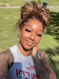 A model displays the UNice 13x4 Bye Bye Slip Lace Frontal Bronde Color With Honey Blonde Highlights Water, showing a model with tattoos and a white shirt and water wave.