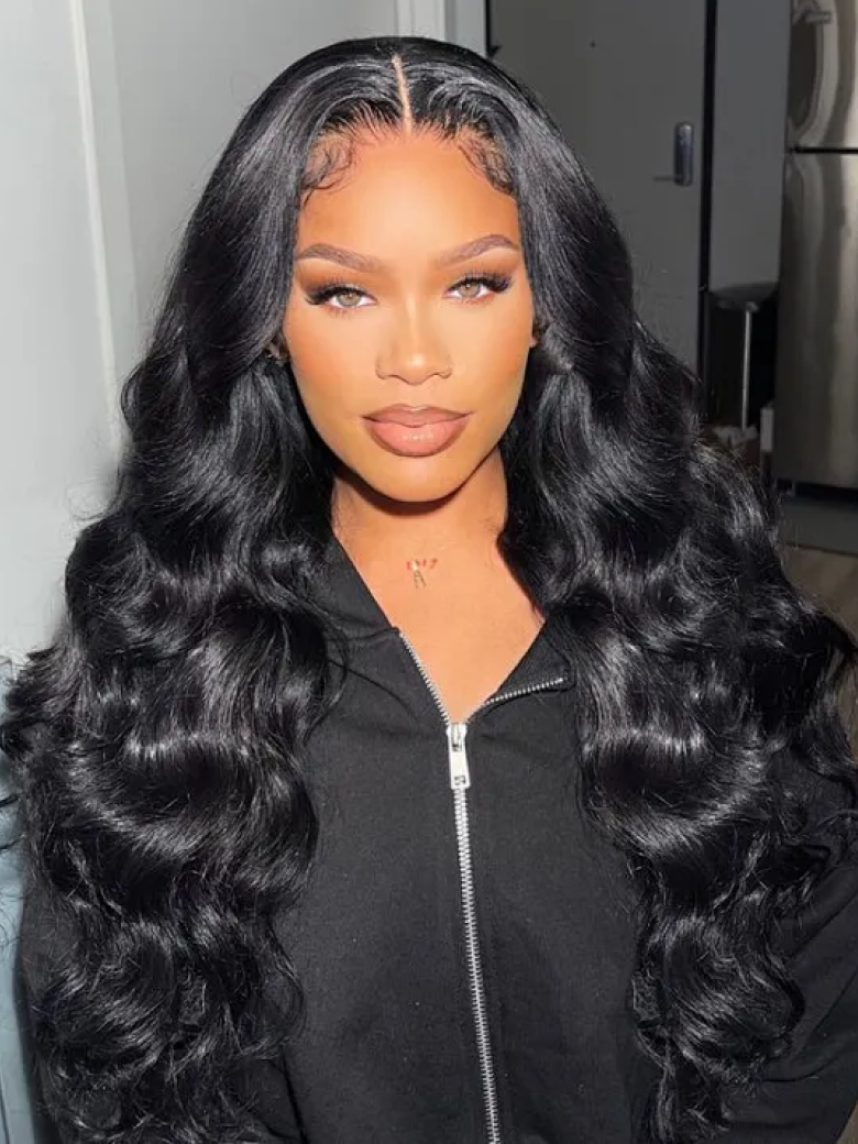 A model displays the UNice Body Wave Beginner Friendly V Part Wig 30 Seconds Quick Install Natural Black, showing a woman wearing a black wig and a black jacket and body.