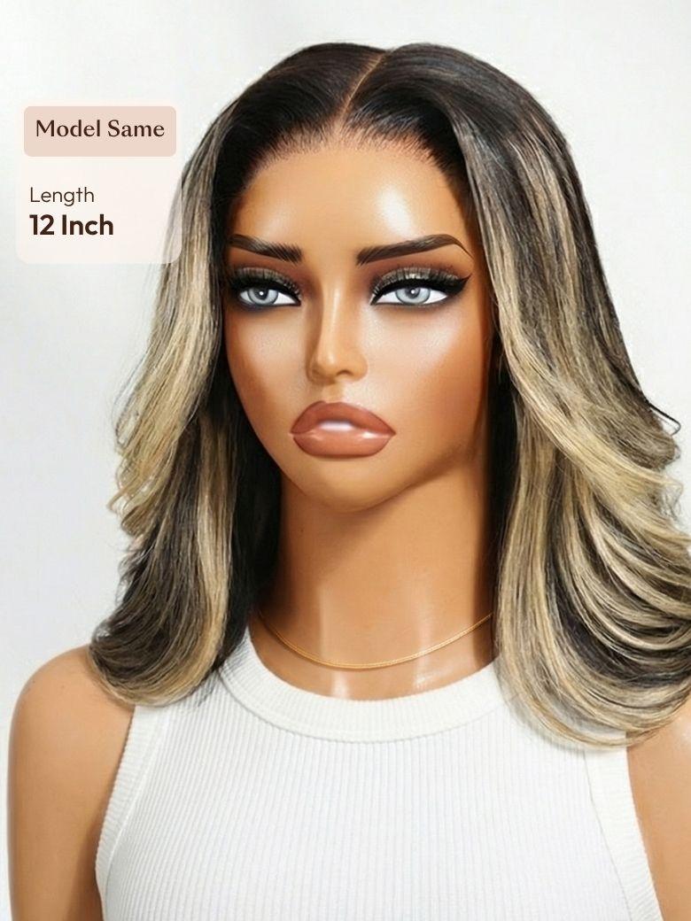 A model displays the UNice 7x5 Bye Bye Slip Lace Dark Brunette with Ash Blonde Highlight Layered Wavy Bob, showing a model with blonde hair and a white top.