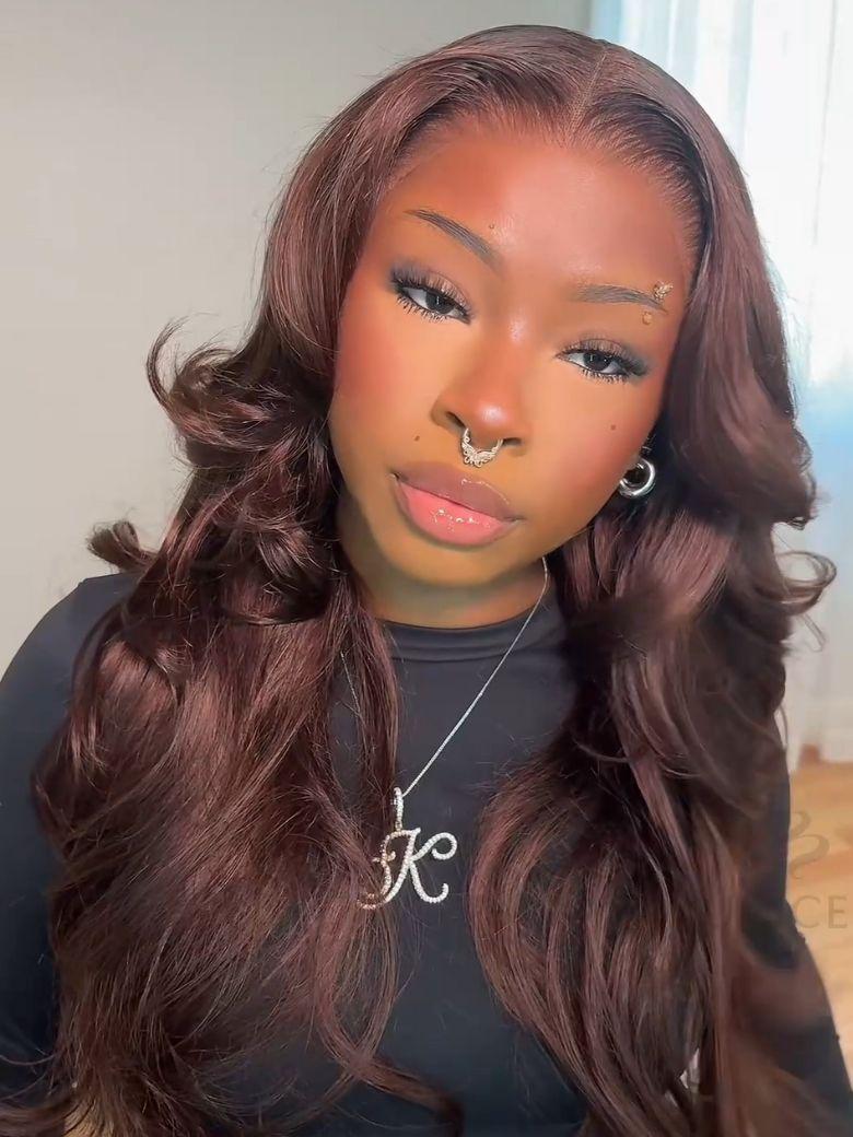 A model displays the UNice 20"-24" Glueless Auburn Brown 13x4 Pre-Everything Lace Frontal Loose Wave, showing a model with long brown hair and a black shirt and loose.