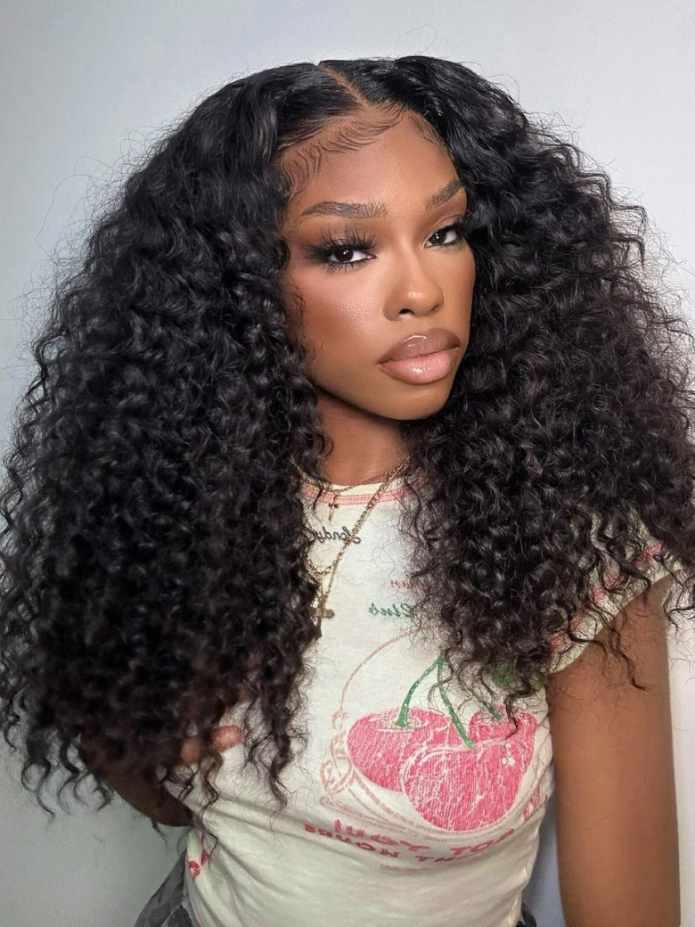 A model displays the UNice 200% Density 13x4 Larger Lace Frontal Curly Hair wig Pre Plucked Human Hair, showing a model with long curly hair wearing a white shirt.