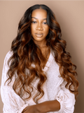 A model displays the UNice Balayage Ombre Highlight Body Wave 4x4 Free Part Lace Closure 1 Piece, showing a model with long brown hair and a white shirt and body wave.