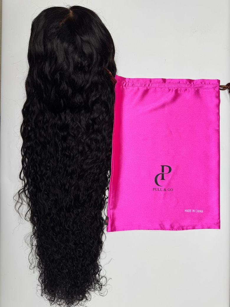 The UNice 13x4 Pre-Everything Transparent & HD Lace Front 3D Body Wave Wig Real Ear To image highlights PULL&GO, MADEINCHINA, a pink bag with a black hair on it and body.