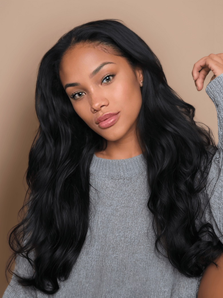 A model displays the UNice Hair 5x5 HD Lace Closure With 4 Bundles Body Wave Human Hair Weaves, showing a model with long black hair wearing a grey sweater and body wave.