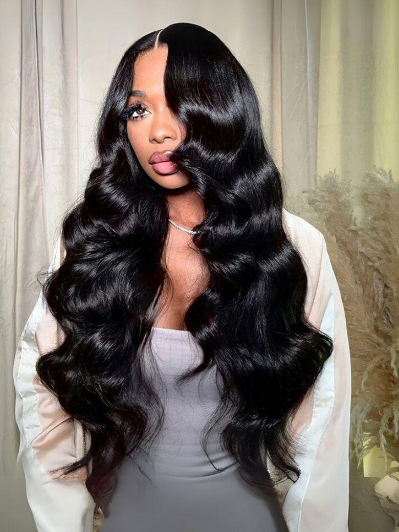 A model displays the UNice 13x4 Pre-Everything Wig With Face-Framing Layers And Side-Swept Bangs With, showing a model with long black hair wearing a white shirt.