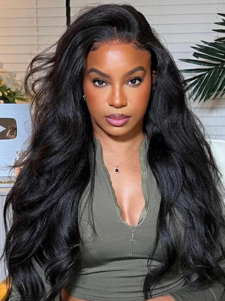 A model displays the UNice 13x6 Lace Frontal Pre-Everything Wig Black Yaki Straight With 4C Curly Baby Hair, showing a model with long black hair and a green top.