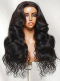 A model displays the UNice 7x5 Bye Bye Slip Glueless Lace Natural Water Wave with Soft Body Wave Wig with, showing a wig with long hair and a long body and body wave.