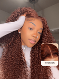 A model displays the UNice 13x4/7x5 Glueless Lace Bye Bye Knots Wig Reddish Brown Curly Wig With Bleached, showing a model with long curly hair is shown in the mirror.
